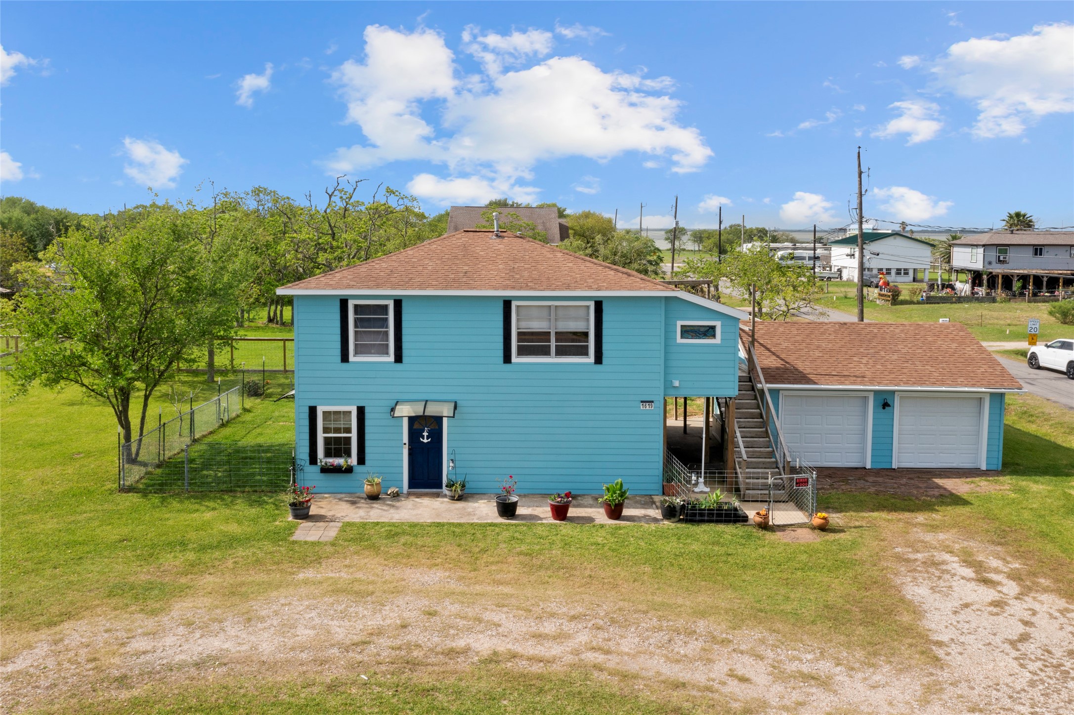 Discover a rare opportunity at 1619 FM 517 Rd E in Dickinson—situated on four lots, this beautifully updated property offers space, flexibility, and income potential all in one.