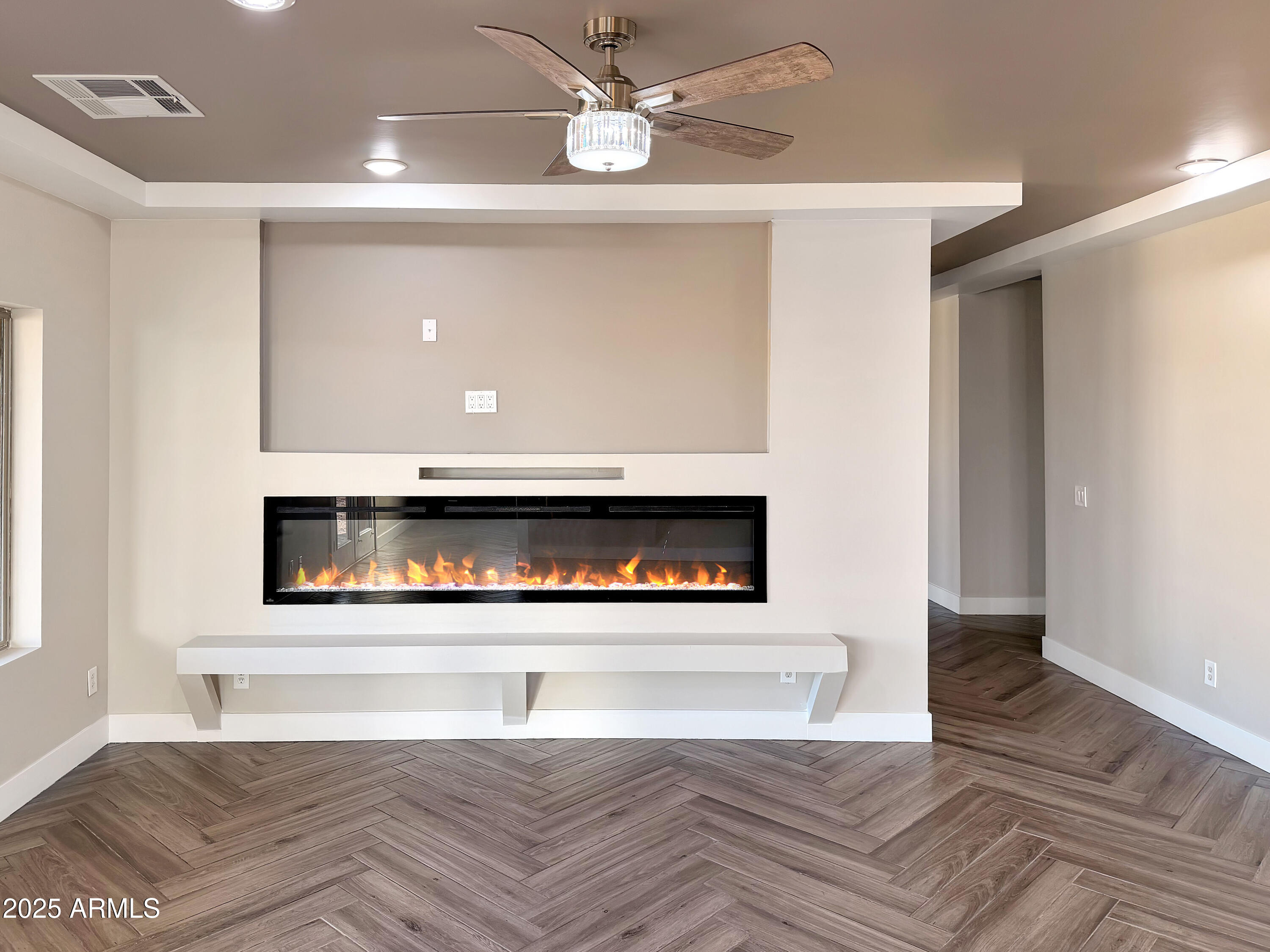 1712 East Joelle Drive Casa Grande, AZ 85122 - Photo 14 of 55 a living room with furniture and a fireplace