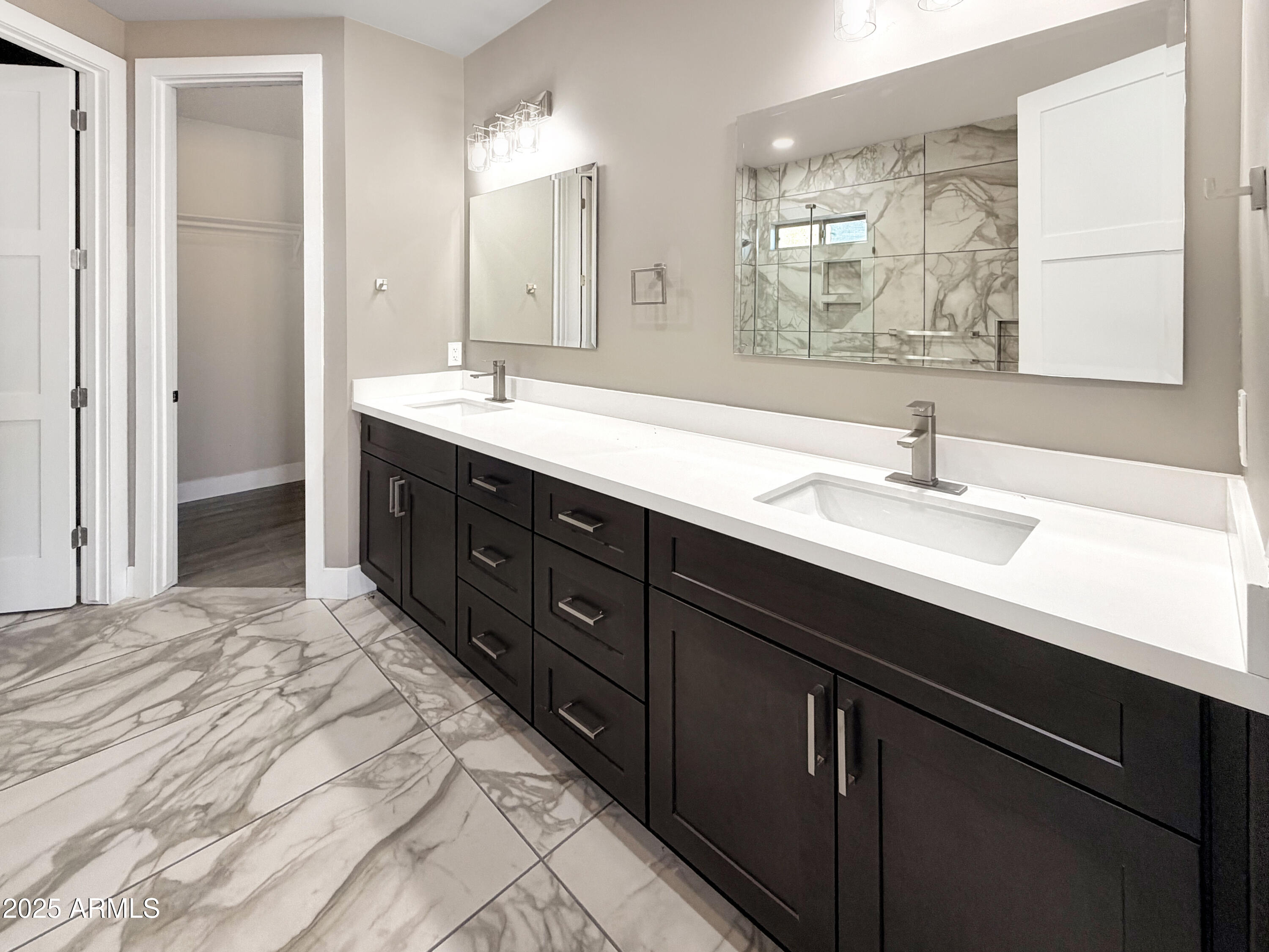 1712 East Joelle Drive Casa Grande, AZ 85122 - Photo 27 of 55 a bathroom with a sink double vanity and a mirror