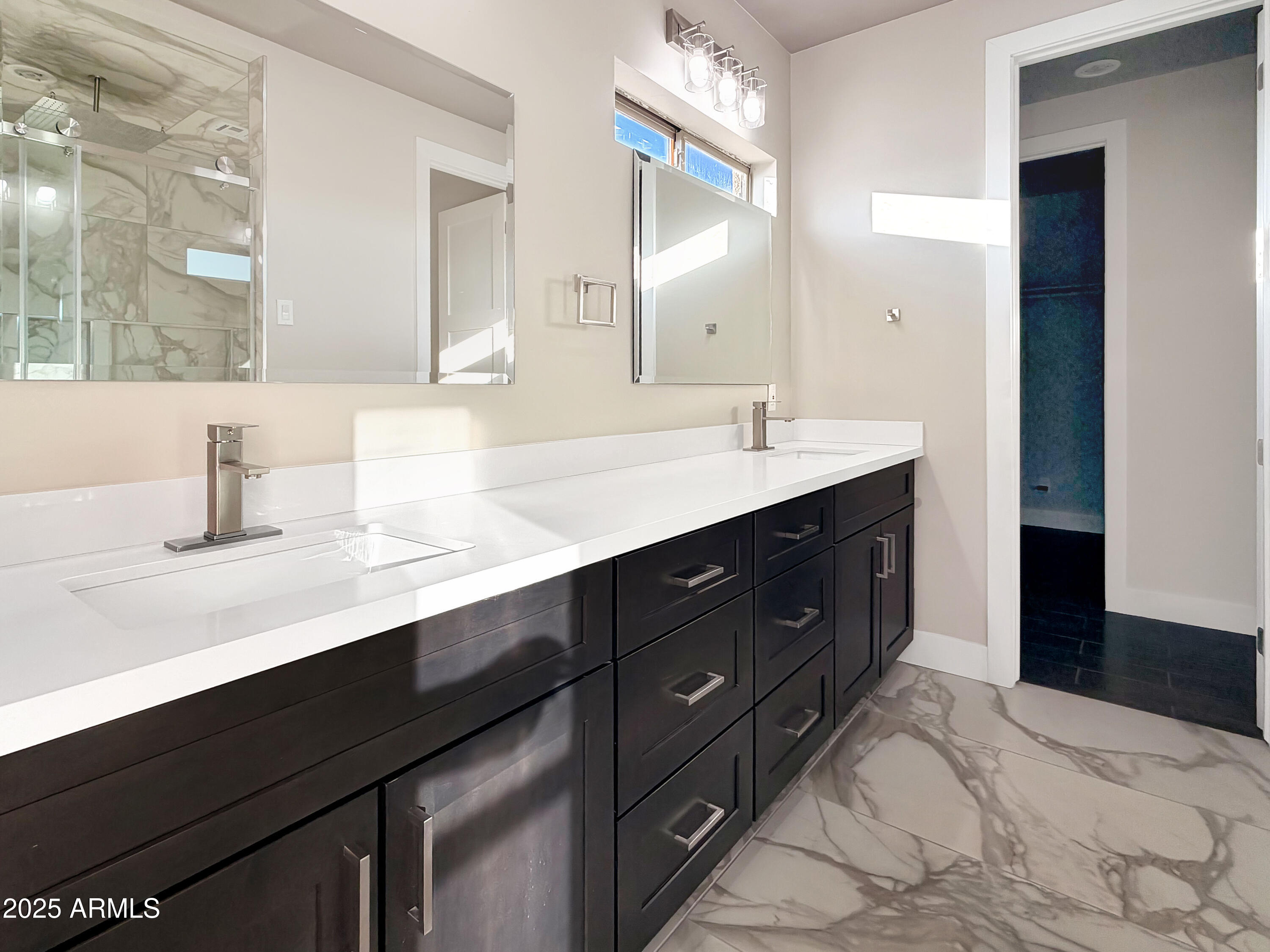 1712 East Joelle Drive Casa Grande, AZ 85122 - Photo 31 of 55 a bathroom with a sink double vanity and a mirror