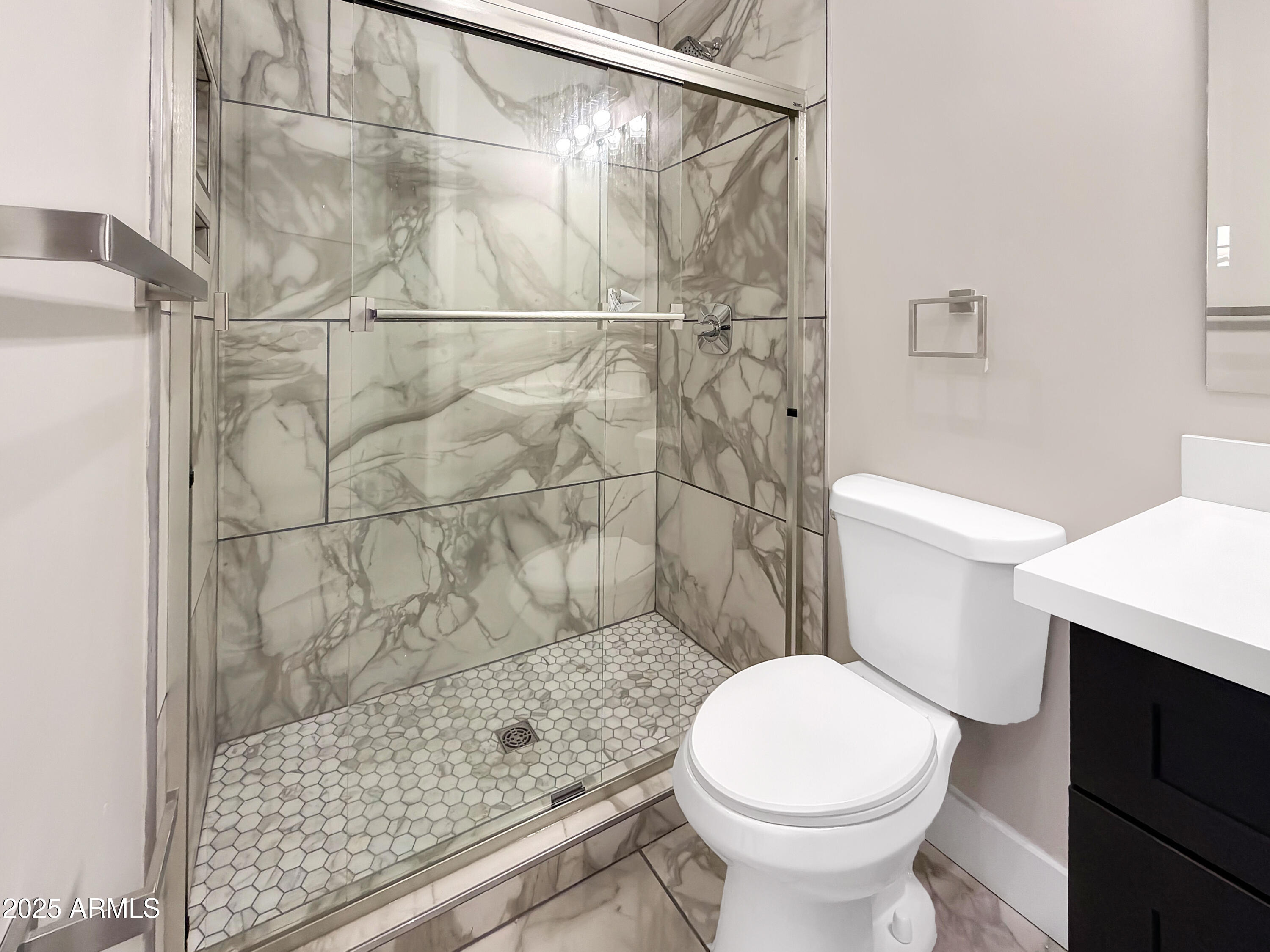 1712 East Joelle Drive Casa Grande, AZ 85122 - Photo 41 of 55 a bathroom with a toilet and a shower