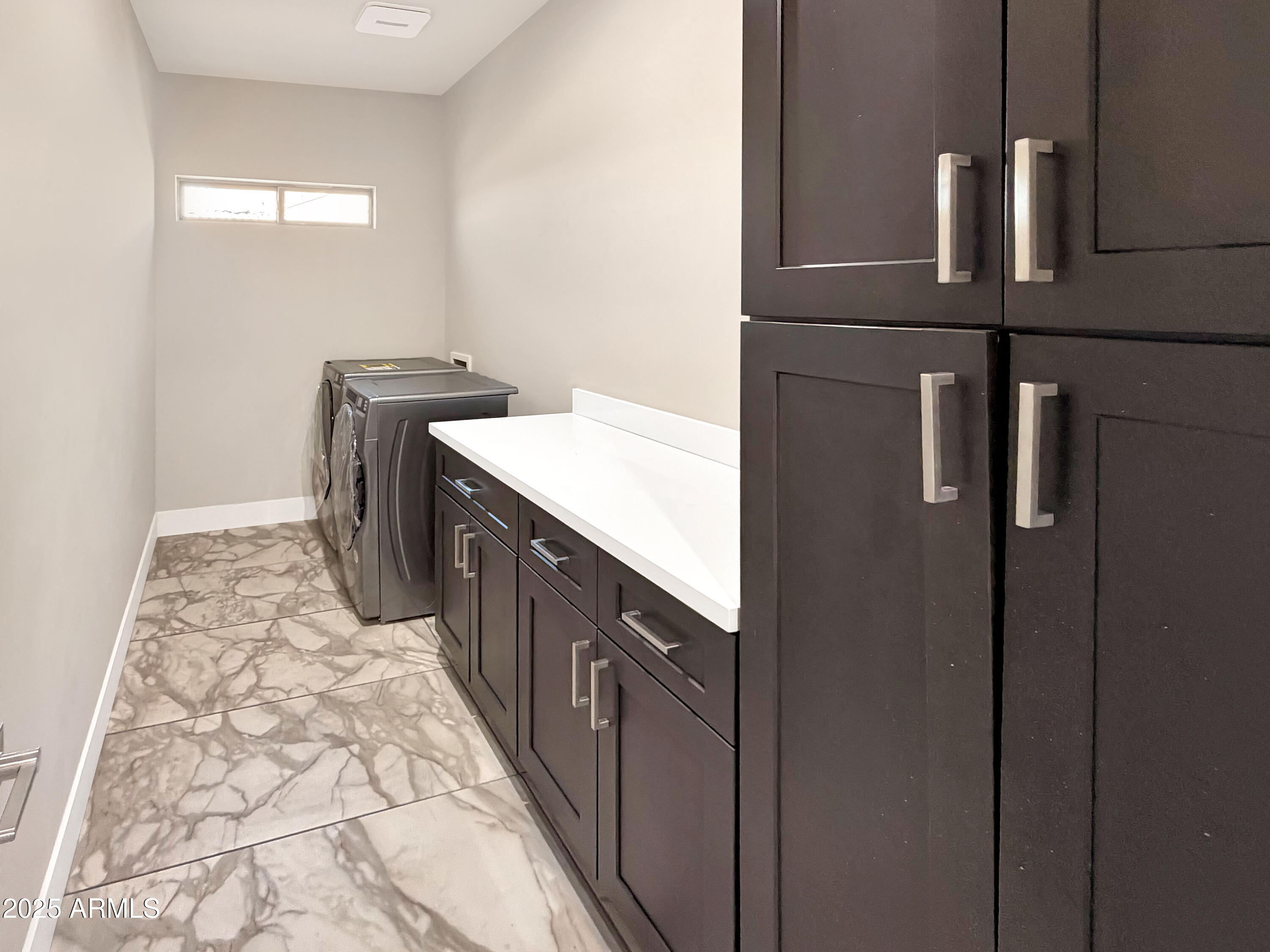1712 East Joelle Drive Casa Grande, AZ 85122 - Photo 42 of 55 a kitchen with a sink stove and refrigerator