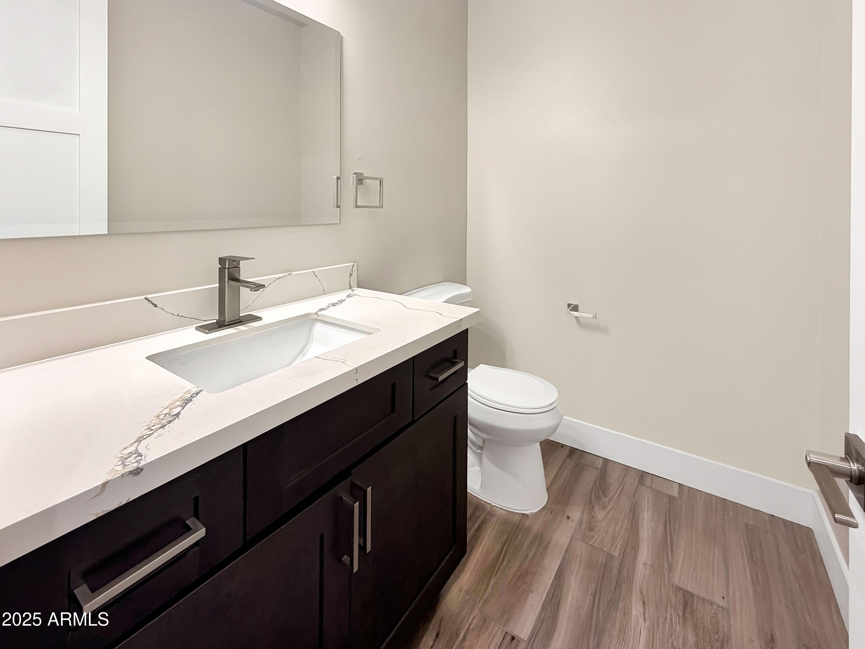 1712 East Joelle Drive Casa Grande, AZ 85122 - Photo 44 of 55 a bathroom with a sink and a mirror