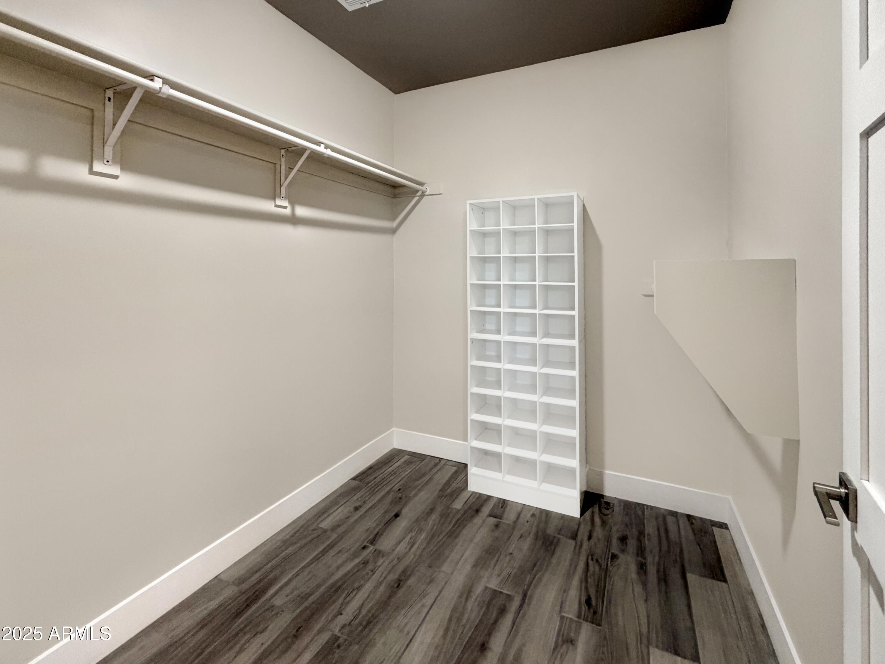 1712 East Joelle Drive Casa Grande, AZ 85122 - Photo 45 of 55 a view of walk in closet with empty racks