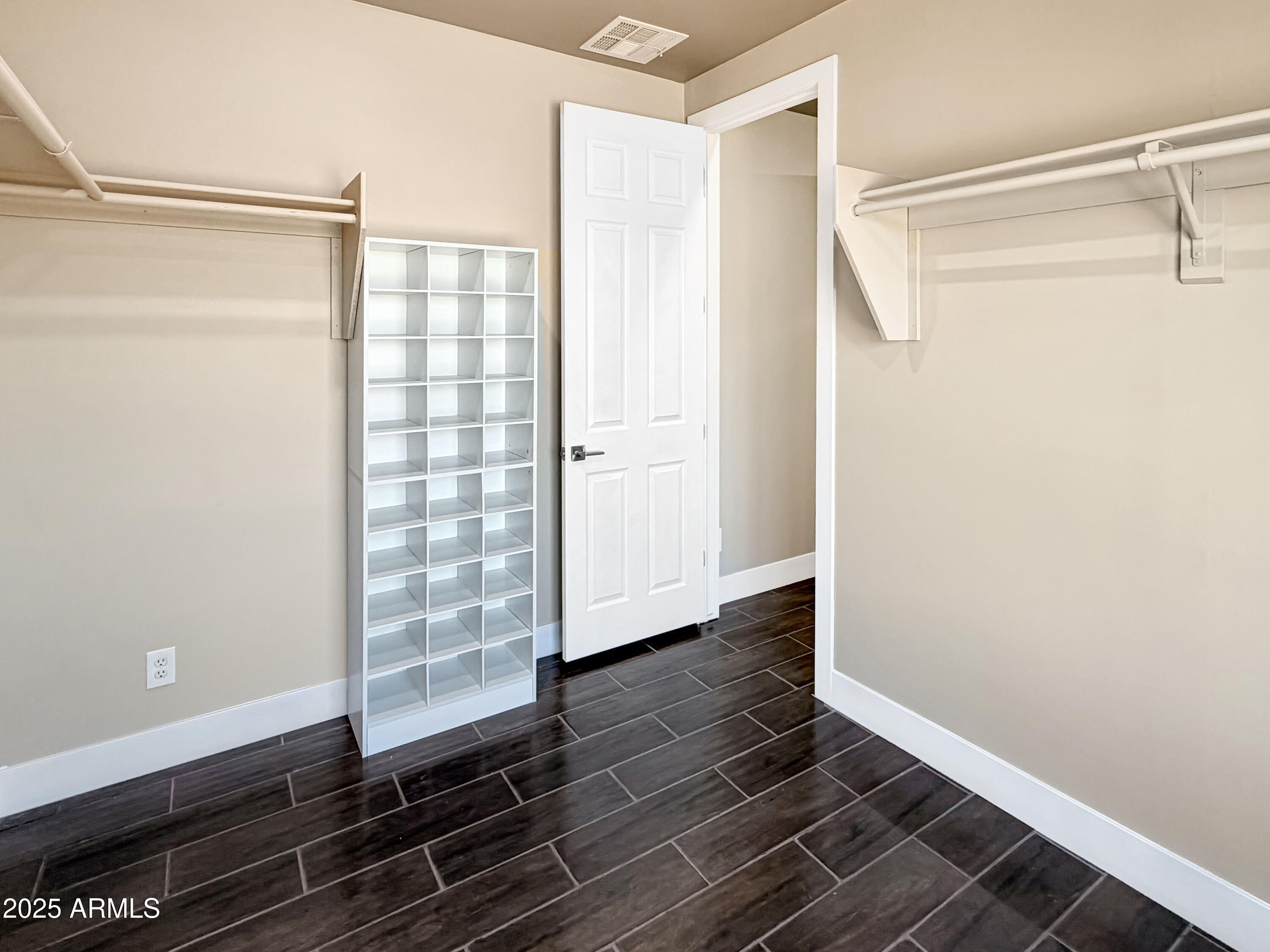 1712 East Joelle Drive Casa Grande, AZ 85122 - Photo 47 of 55 a view of a room with wooden floor