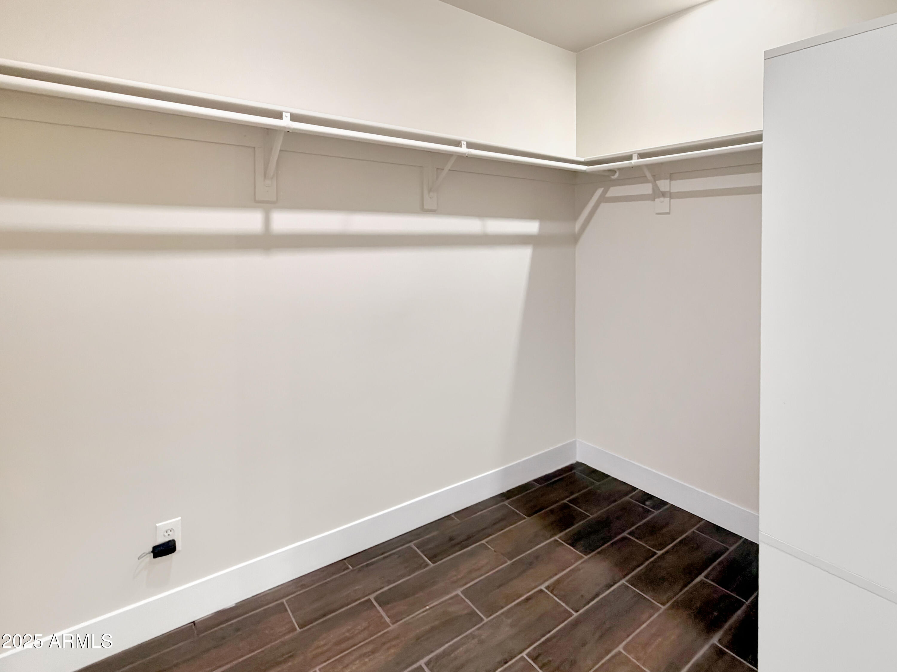 1712 East Joelle Drive Casa Grande, AZ 85122 - Photo 48 of 55 a view of a room with wooden floor