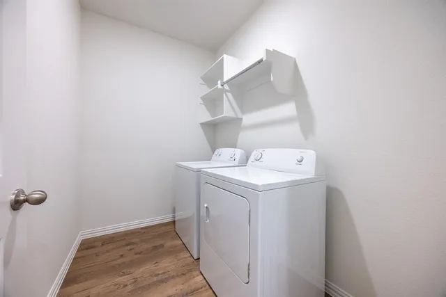a open kitchen with white cabinets stainless steel appliances