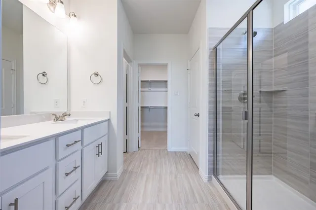 a view of an empty walk in closet