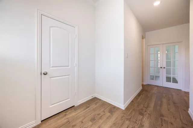 an empty room with windows