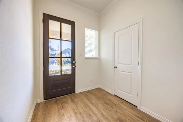 a bathroom with a sink a mirror and a toilet