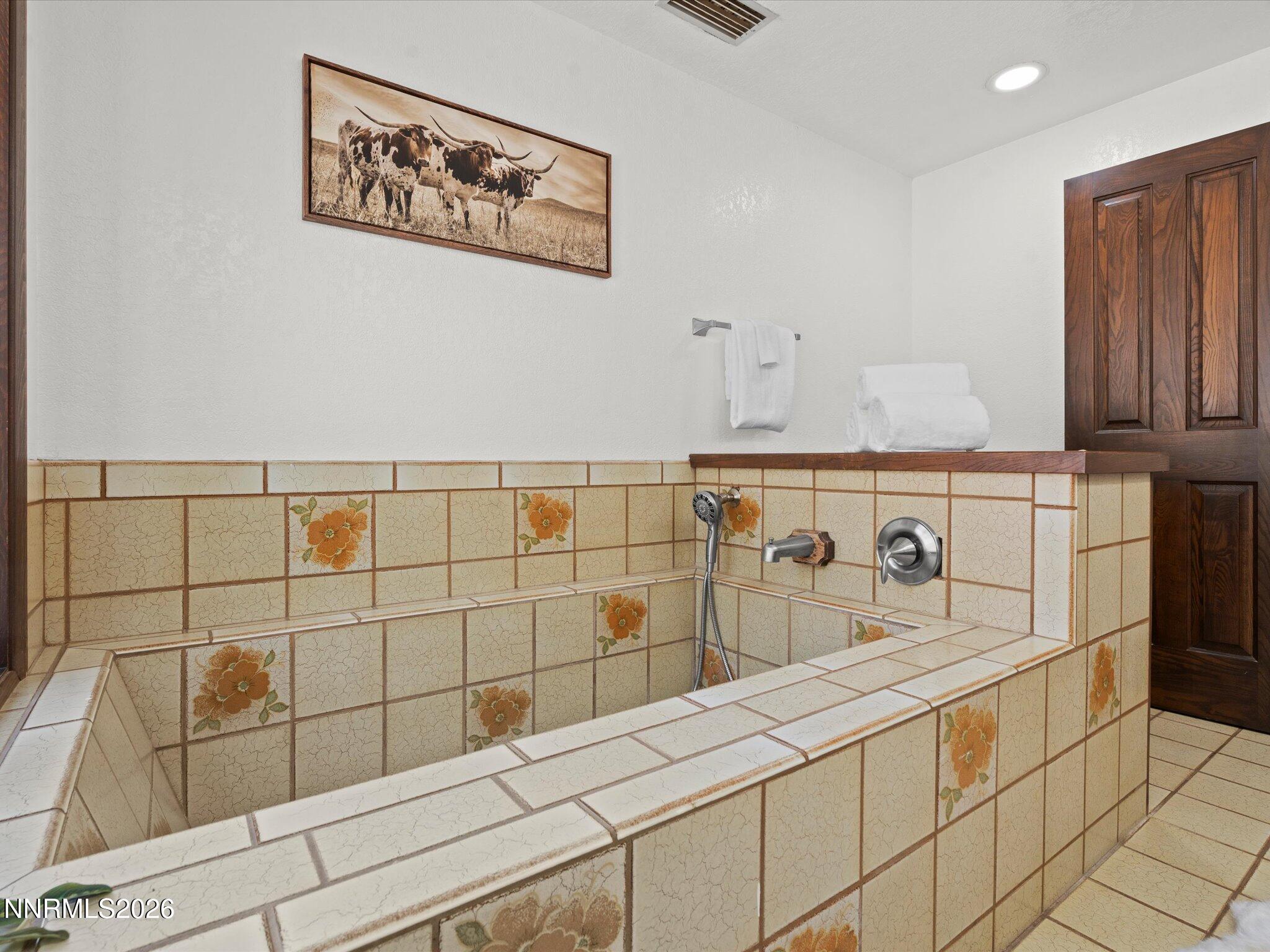 20449 Temelec Way Reno, NV 89521 - Photo 34 of 65 a bathroom with a sink and a shower
