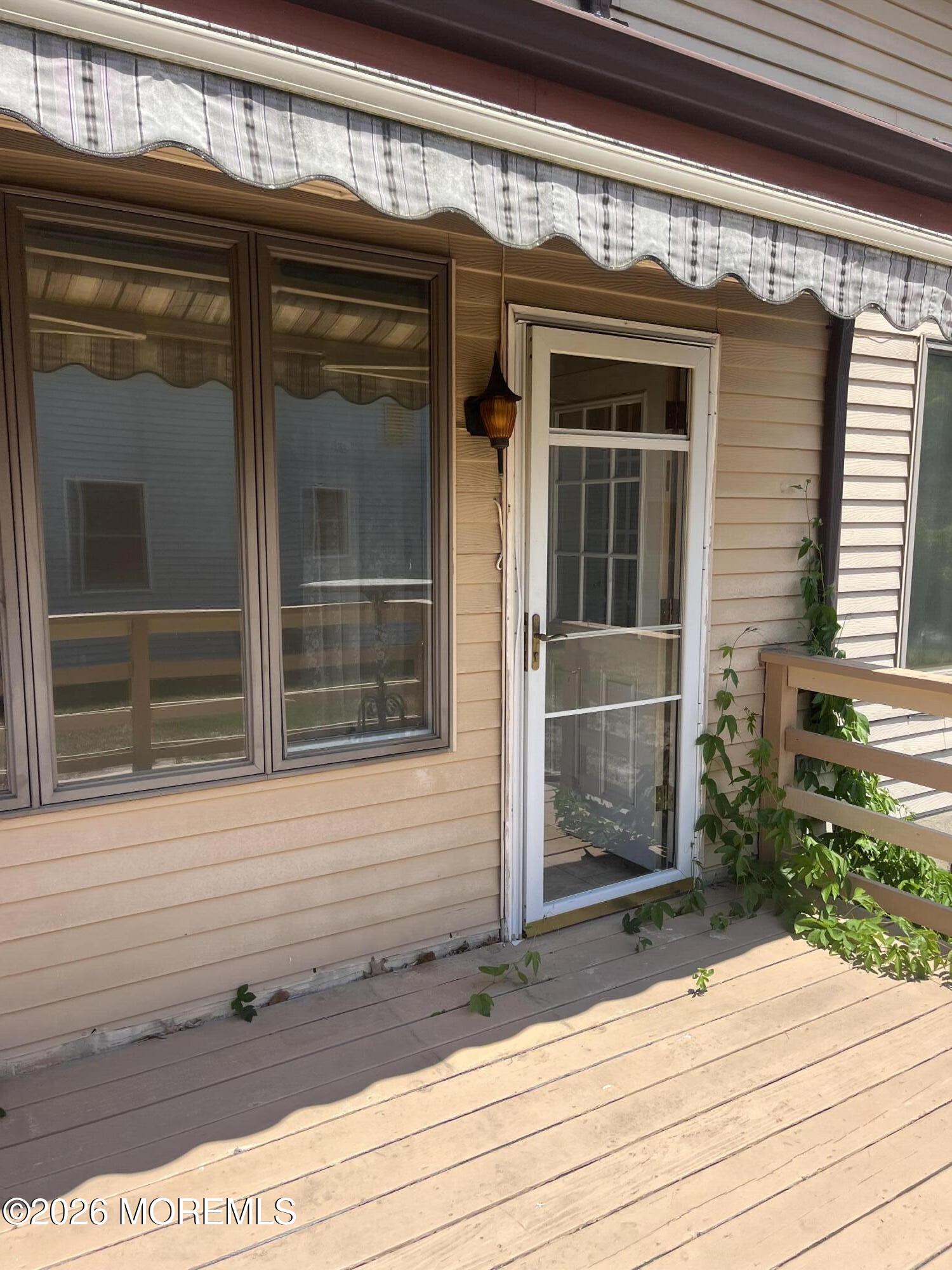 40 Sycamore Access Road, Unit 40 Manahawkin, NJ 08050 - Photo 14 of 27 Back Door Outside View