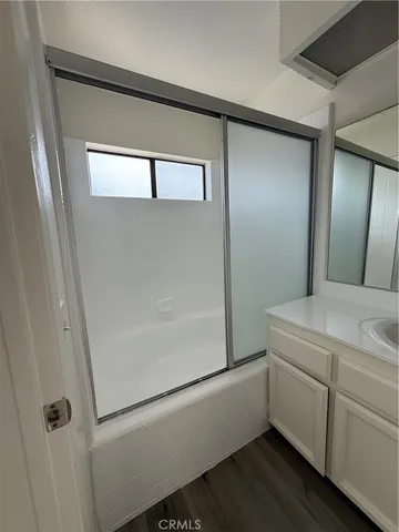 a bathroom with a toilet and a sink