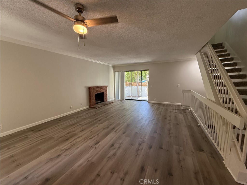 5250 Colodny Drive, Unit 17 Agoura Hills, CA 91301 - Photo 3 of 17 wooden floor in an empty room with a window