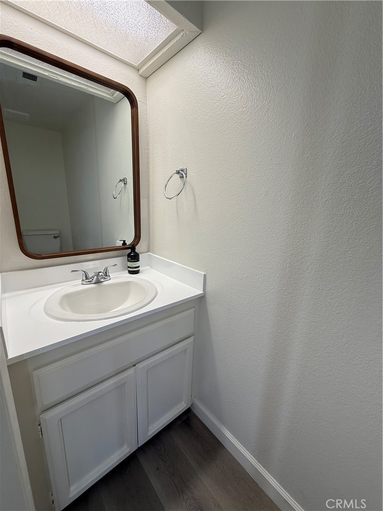 5250 Colodny Drive, Unit 17 Agoura Hills, CA 91301 - Photo 8 of 17 a bathroom with a sink and a mirror