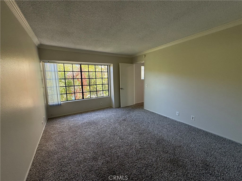 5250 Colodny Drive, Unit 17 Agoura Hills, CA 91301 - Photo 9 of 17 an empty room with windows