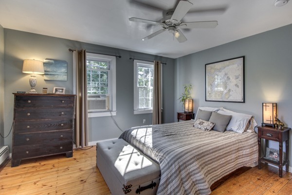 3 1/2 Becket Avenue, Unit 3 Salem, MA 01970 - Photo 12 of 22 a bedroom with a bed and a dresser