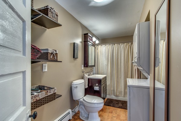 3 1/2 Becket Avenue, Unit 3 Salem, MA 01970 - Photo 17 of 22 a bathroom with a toilet a sink and a shower