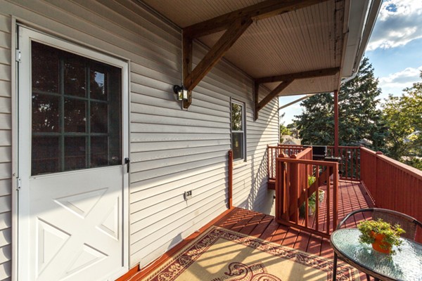 3 1/2 Becket Avenue, Unit 3 Salem, MA 01970 - Photo 19 of 22 a view of a balcony with chairs