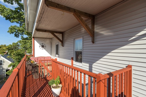 3 1/2 Becket Avenue, Unit 3 Salem, MA 01970 - Photo 22 of 22 a backyard of a house with wooden floor