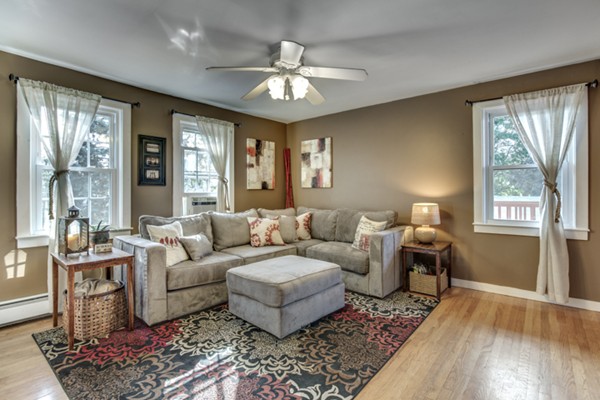 3 1/2 Becket Avenue, Unit 3 Salem, MA 01970 - Photo 8 of 22 a living room with furniture and a large window