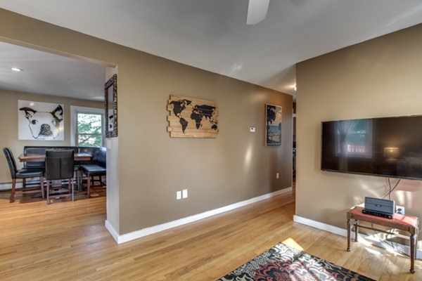 3 1/2 Becket Avenue, Unit 3 Salem, MA 01970 - Photo 10 of 22 a living room with furniture and a flat screen tv