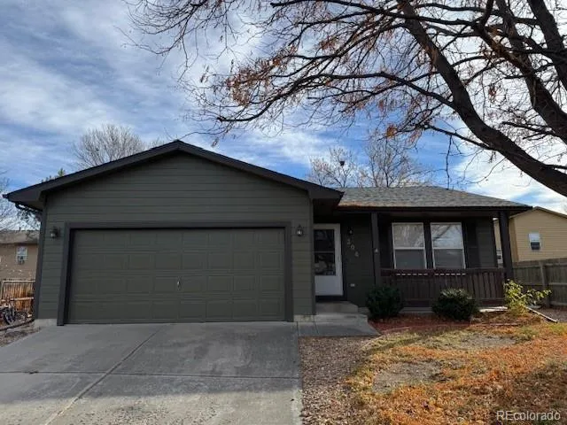 a house with a tree in front of it