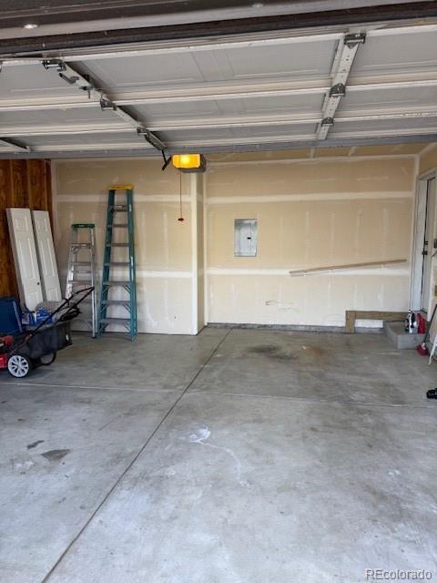 304 Sunset Lane Dacono, CO 80514 - Photo 20 of 22 a view of a garage