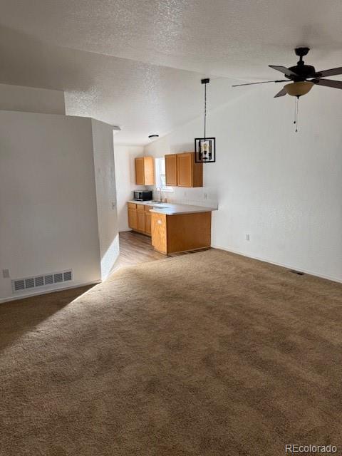 304 Sunset Lane Dacono, CO 80514 - Photo 4 of 22 a view of a room with a sink