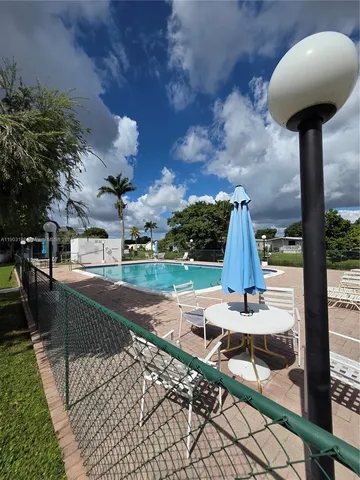 a car parked in front of a house