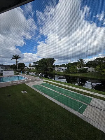 a open kitchen with cabinets table and chairs