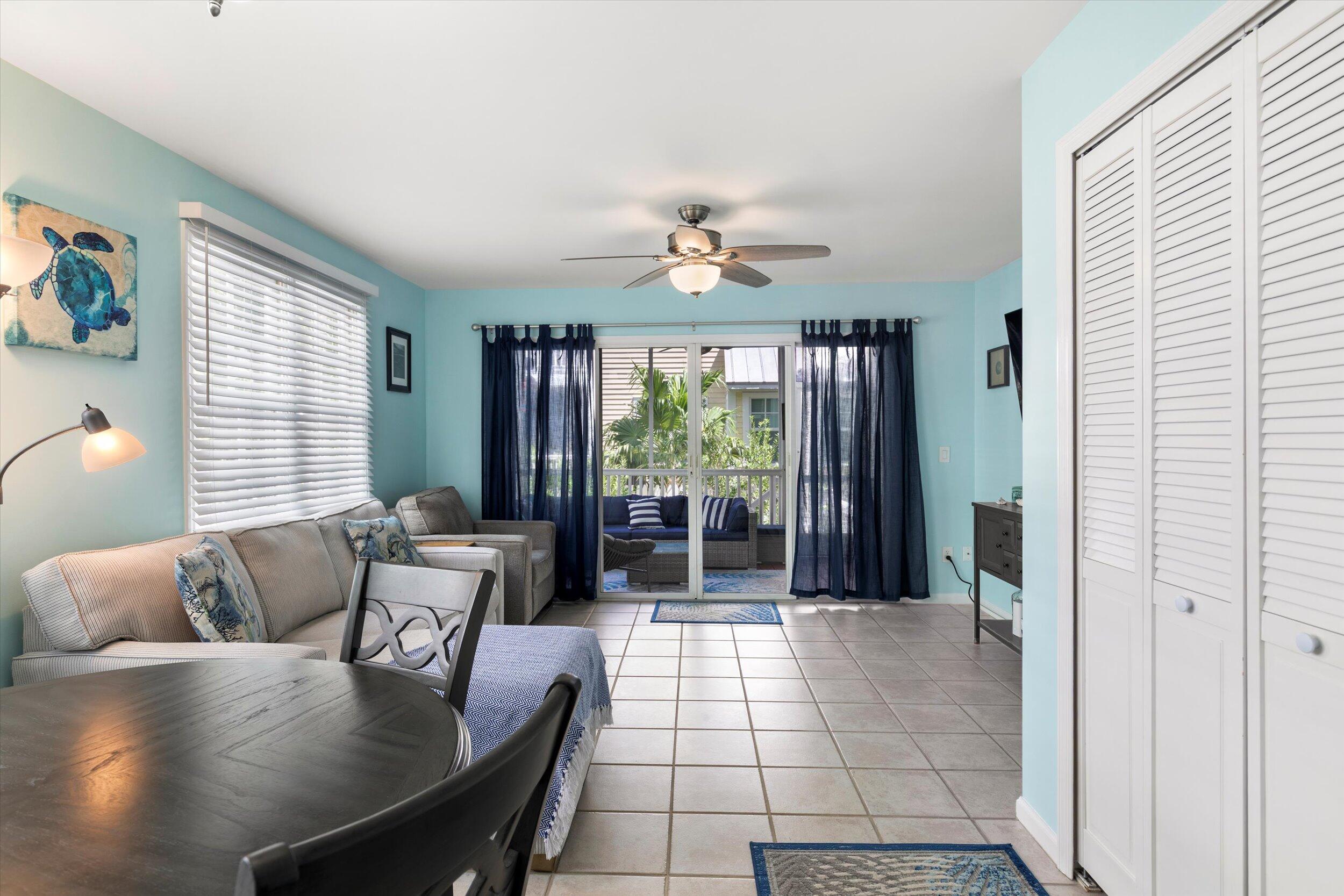 45 Spoonbill Way Key West, FL 33040 - Photo 12 of 80 a living room with furniture and a large window