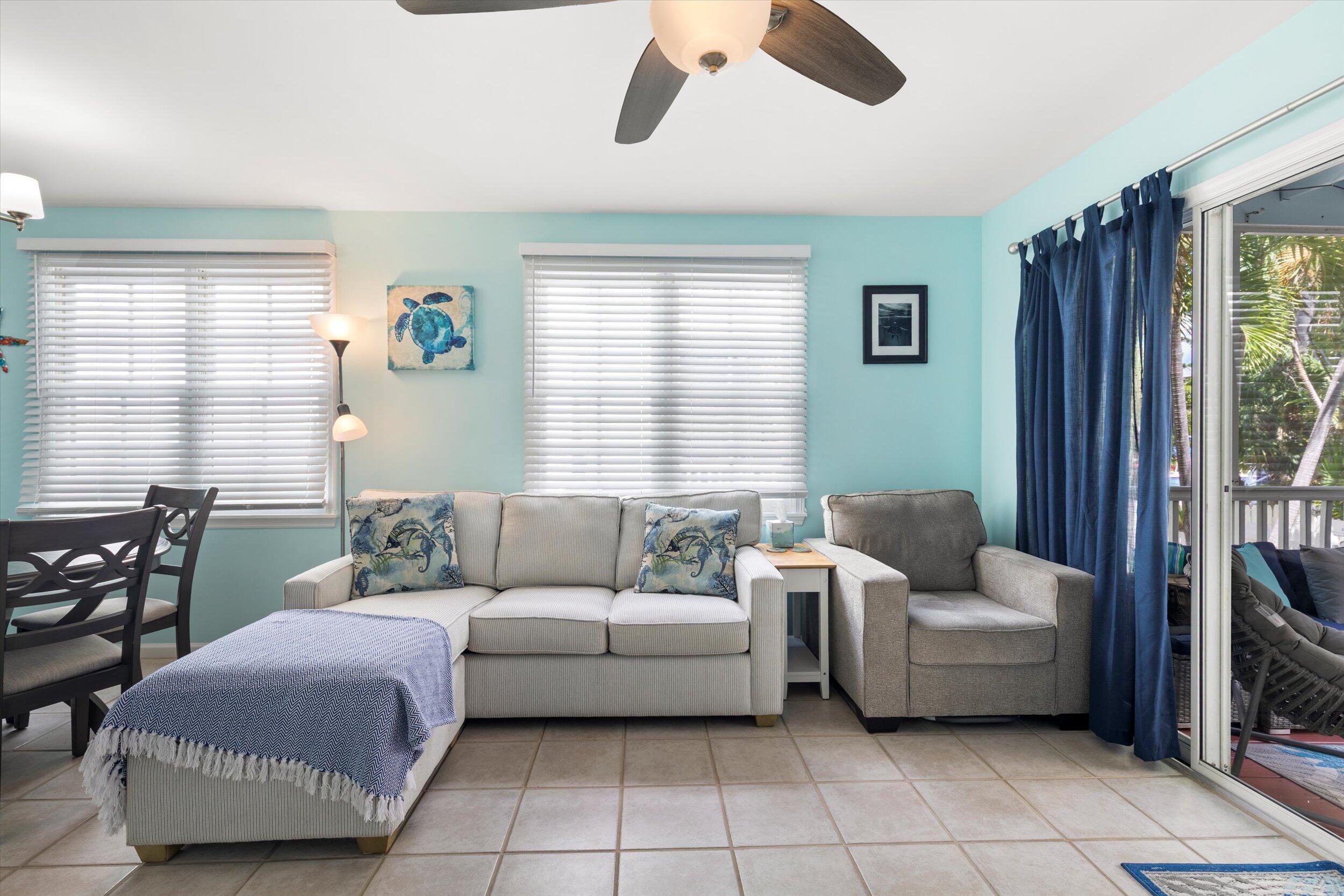 45 Spoonbill Way Key West, FL 33040 - Photo 20 of 80 a living room with furniture and a window