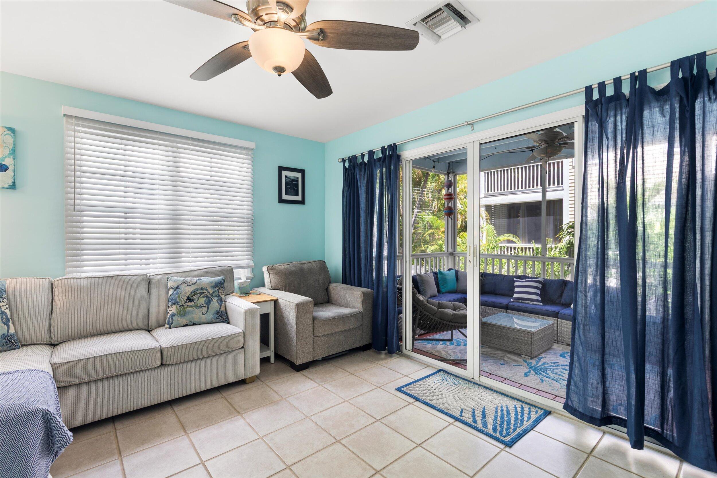 45 Spoonbill Way Key West, FL 33040 - Photo 21 of 80 a living room with furniture and a window