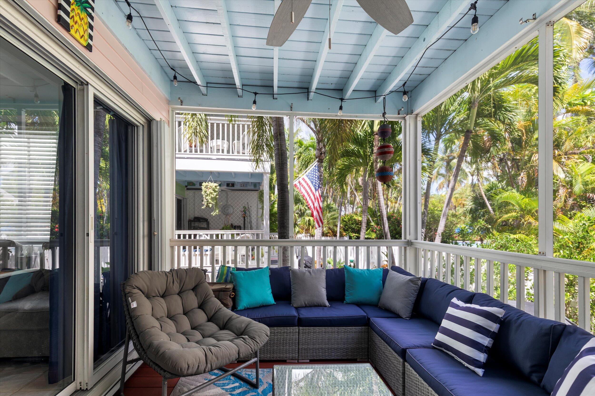 45 Spoonbill Way Key West, FL 33040 - Photo 22 of 80 a living room with furniture and a large window