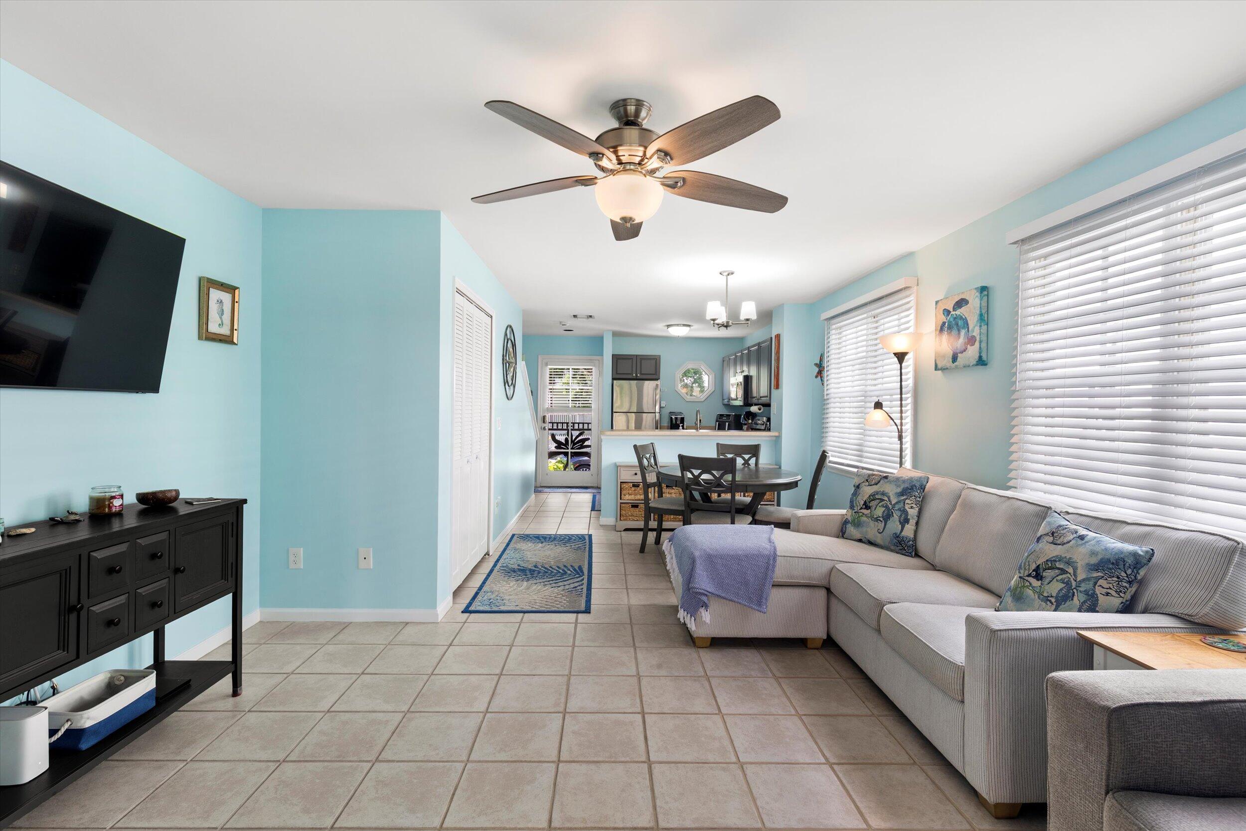 45 Spoonbill Way Key West, FL 33040 - Photo 23 of 80 a living room with furniture and a flat screen tv