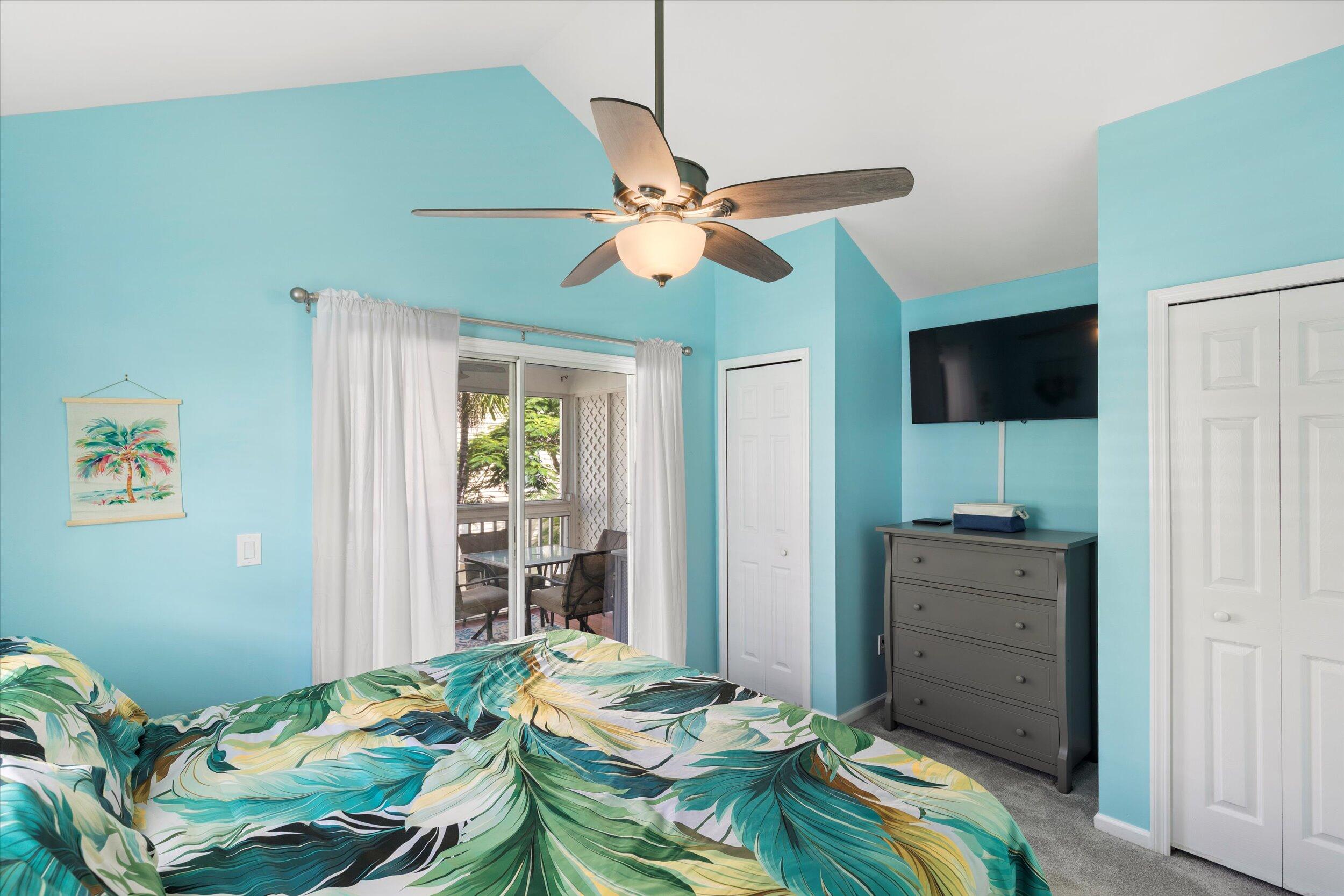 45 Spoonbill Way Key West, FL 33040 - Photo 29 of 80 a bedroom with a bed and a chandelier