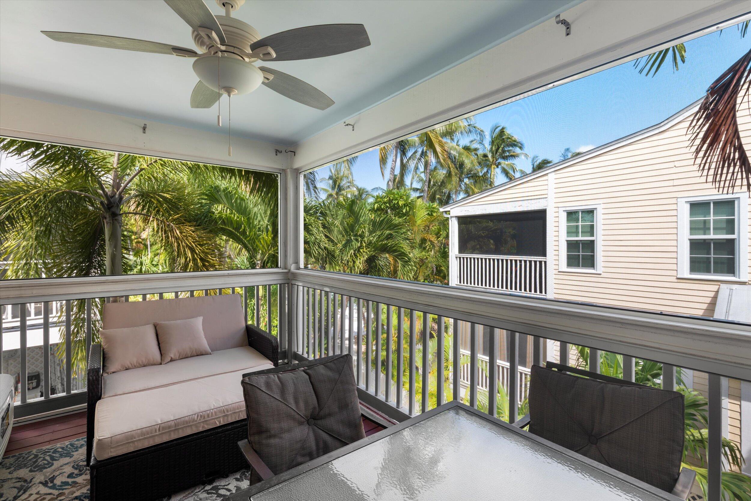 45 Spoonbill Way Key West, FL 33040 - Photo 32 of 80 a balcony with furniture