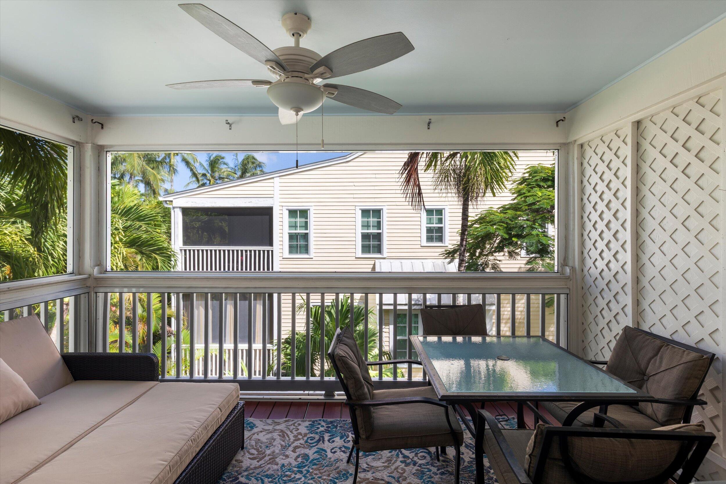 45 Spoonbill Way Key West, FL 33040 - Photo 33 of 80 a view of a dining room with furniture window and outside view