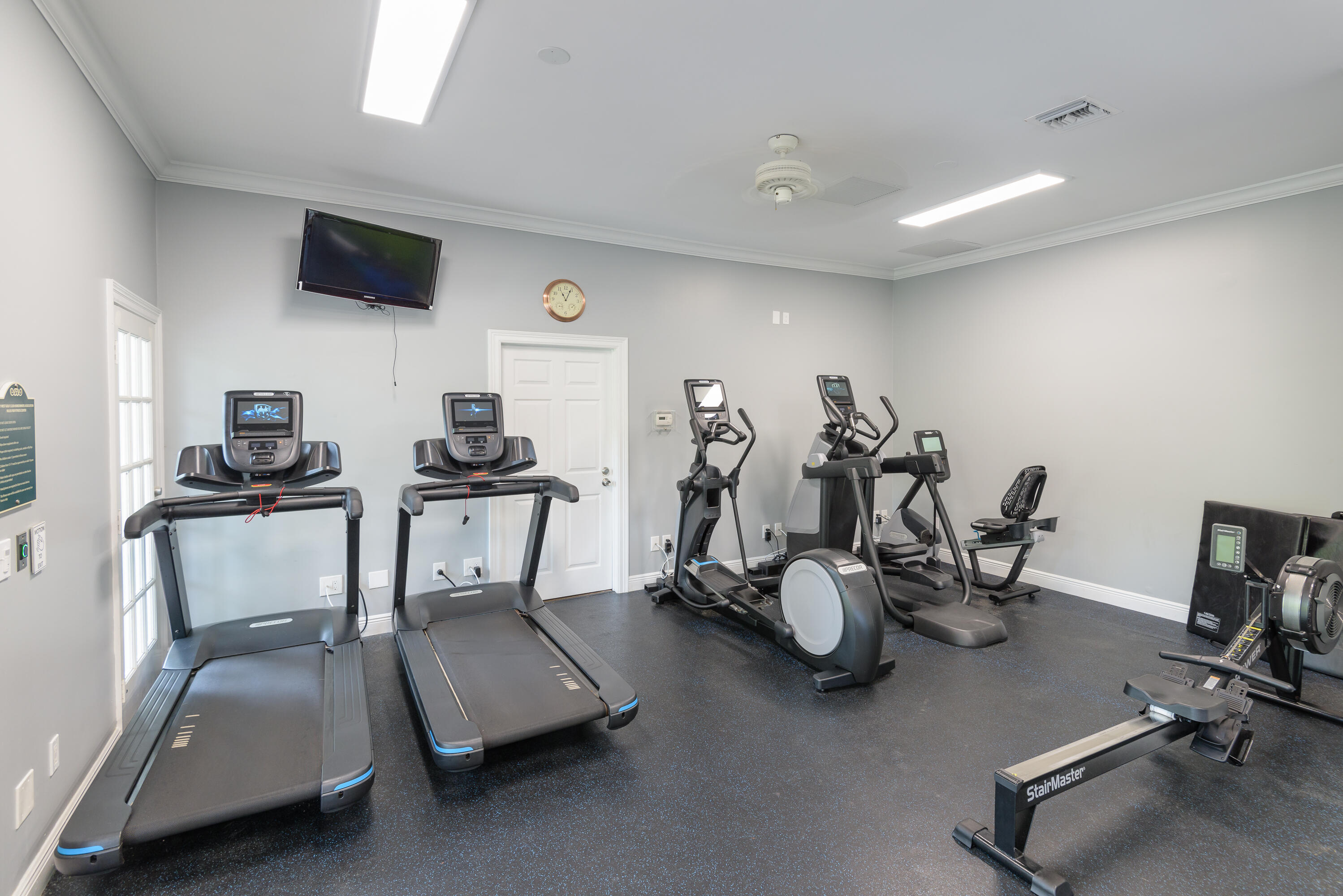 45 Spoonbill Way Key West, FL 33040 - Photo 66 of 80 a room with gym equipment and a flat screen tv