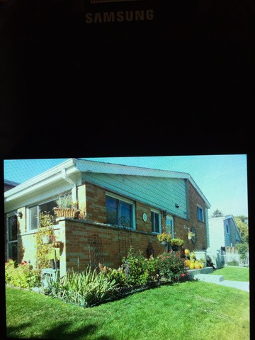 540 Glendale Road Glenview, IL 60025 - Photo 2 of 18 a front view of a house with a garden