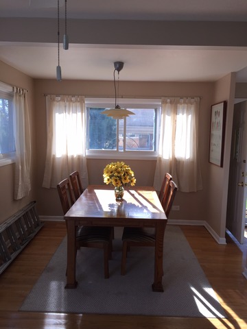 540 Glendale Road Glenview, IL 60025 - Photo 7 of 18 a view of a dining room with furniture window and wooden floor