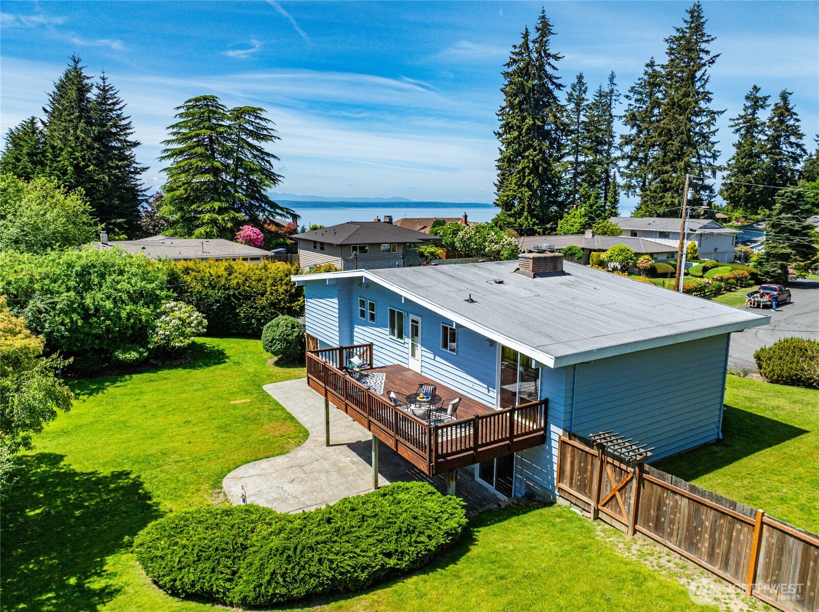 9114 207th Place Southwest Edmonds, WA 98026 - Photo 29 of 36 a aerial view of a house with swimming pool and big yard