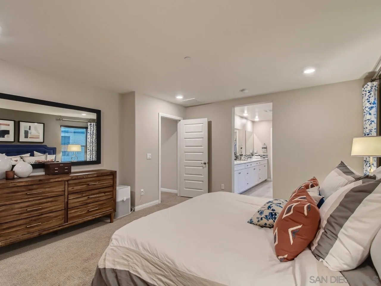 10660 Busch Street Spring Valley, CA 91978 - Photo 15 of 29 a bedroom with a bed and a dresser