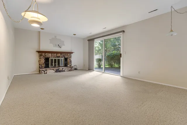 a bed room with furniture and a chandelier
