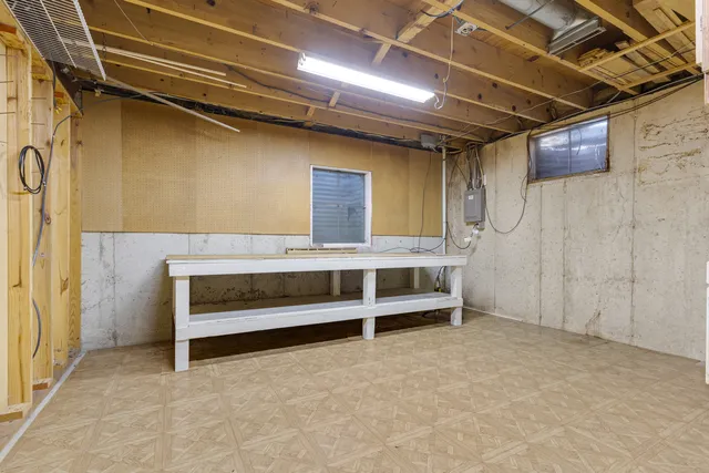 a view of a house with a small yard