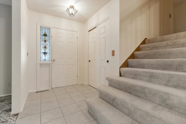 a view of an entryway with staircase