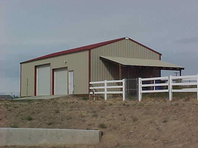 100 Coombs Road Moxee, WA 98936 - Photo 3 of 9 a front view of a house with a yard