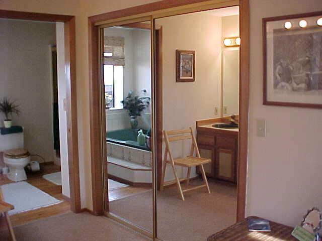 100 Coombs Road Moxee, WA 98936 - Photo 5 of 9 a view of a hallway with bathroom and a room
