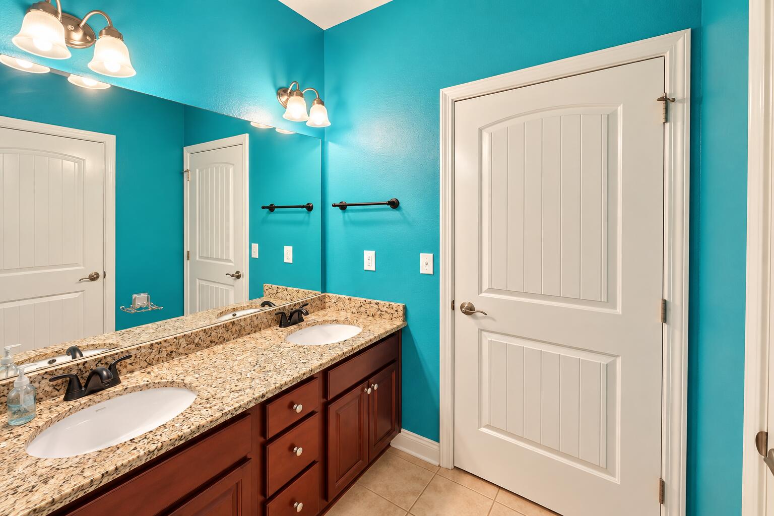 3445 Brownstone Road Crestview, FL 32539 - Photo 13 of 21 Bright Teal Double-Vanity Bathroom